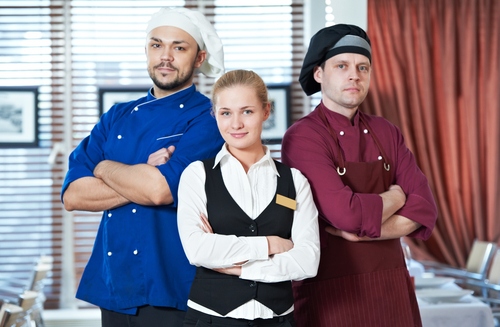 Restaurant Technology Rentals 2 chefs and a hostess stand with their arms crossed